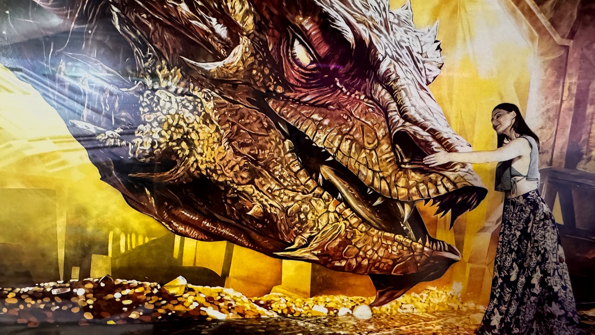 A hand-painted 3D dragon mural at the Museum of Illusions Barcelona