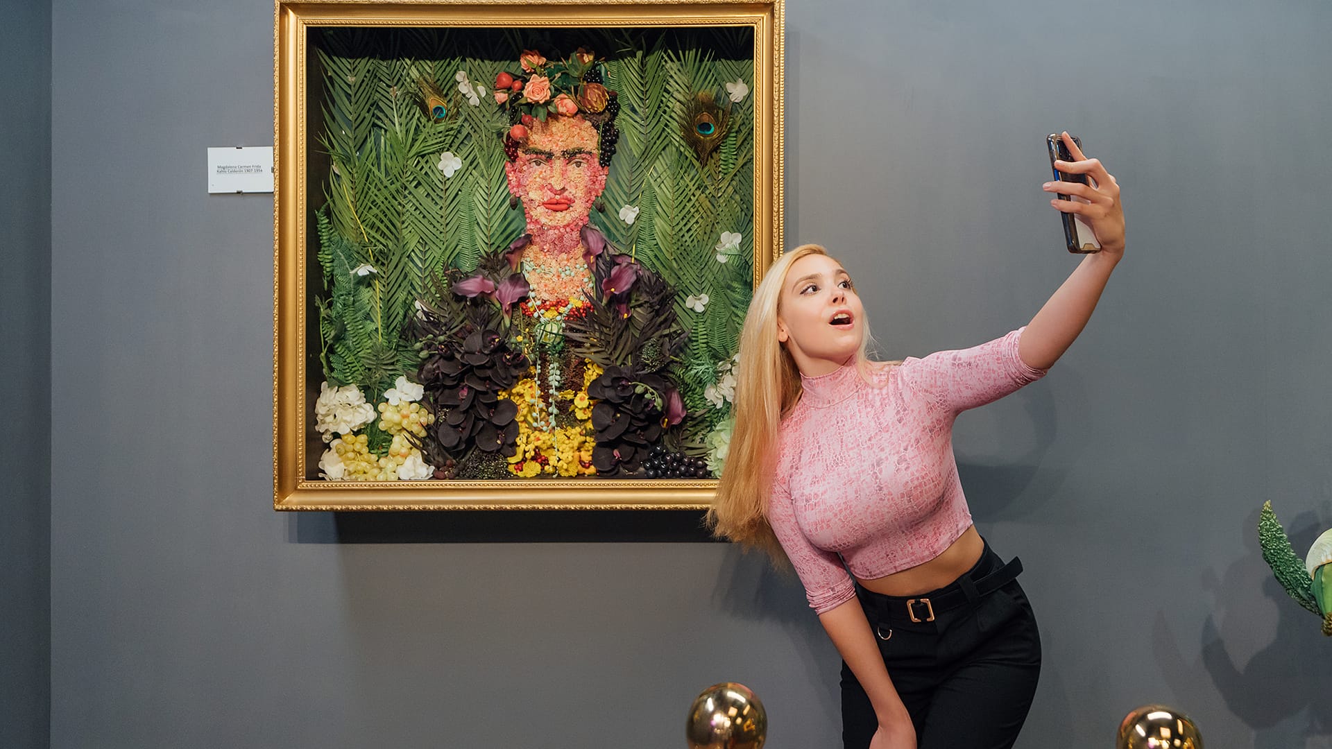 A portrait of Frida Kahlo recreated entirely from fruit, flowers and vegetables